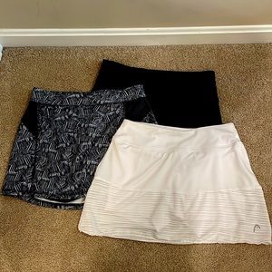 Three XS tennis/athletic skirts! Good condition. One is Head brand!
